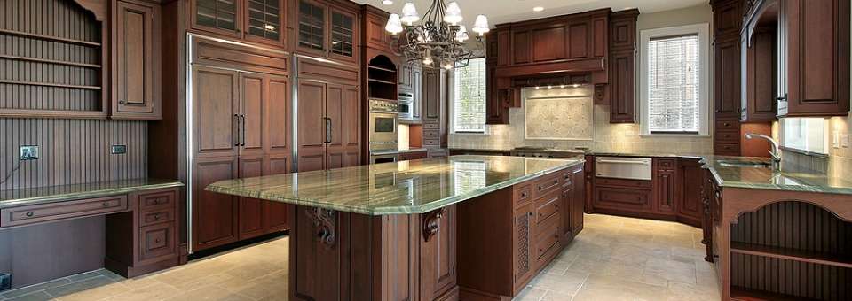 Large kitchen in new home by American Design in Florida
